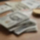 A close-up of cash notes and a Capital One credit card